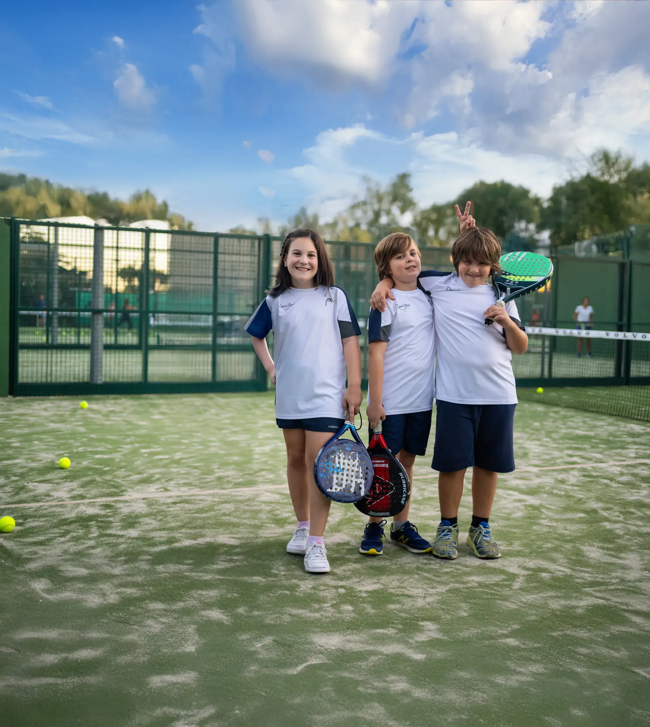 Kids holding Padel racquets