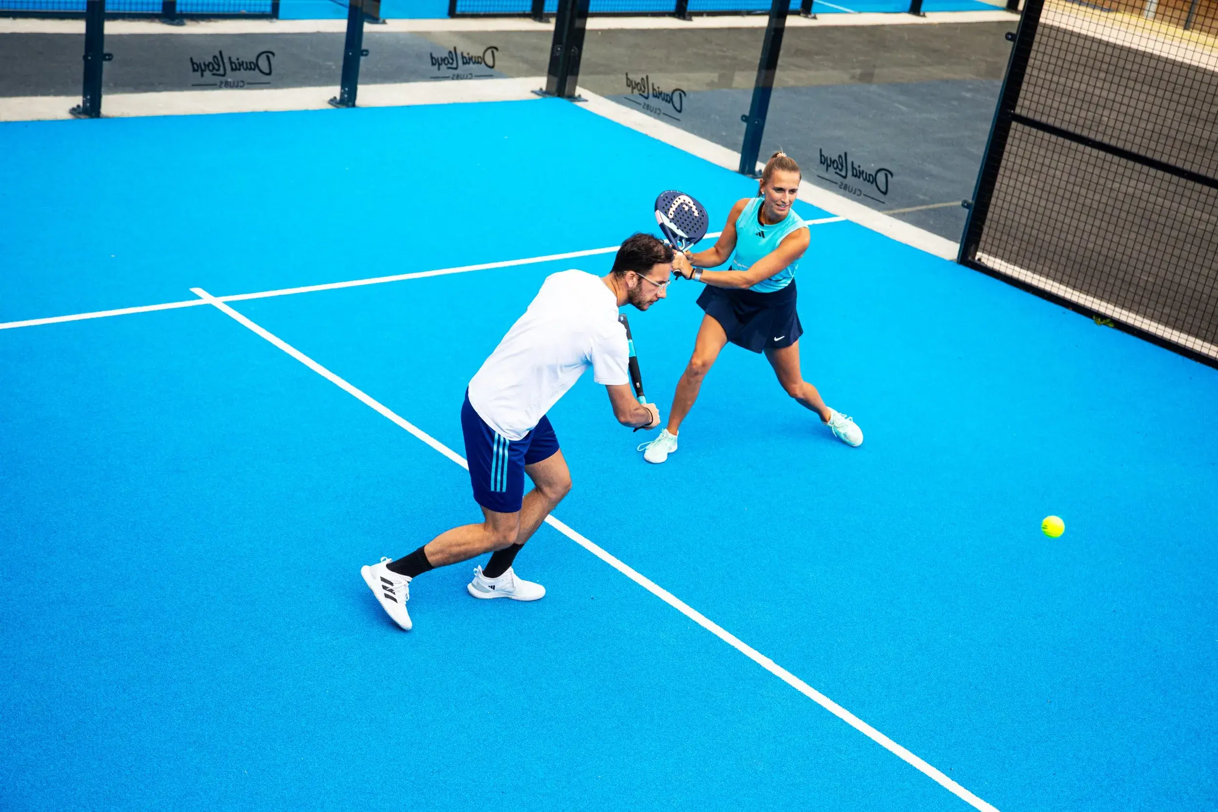 Two people playing Padel