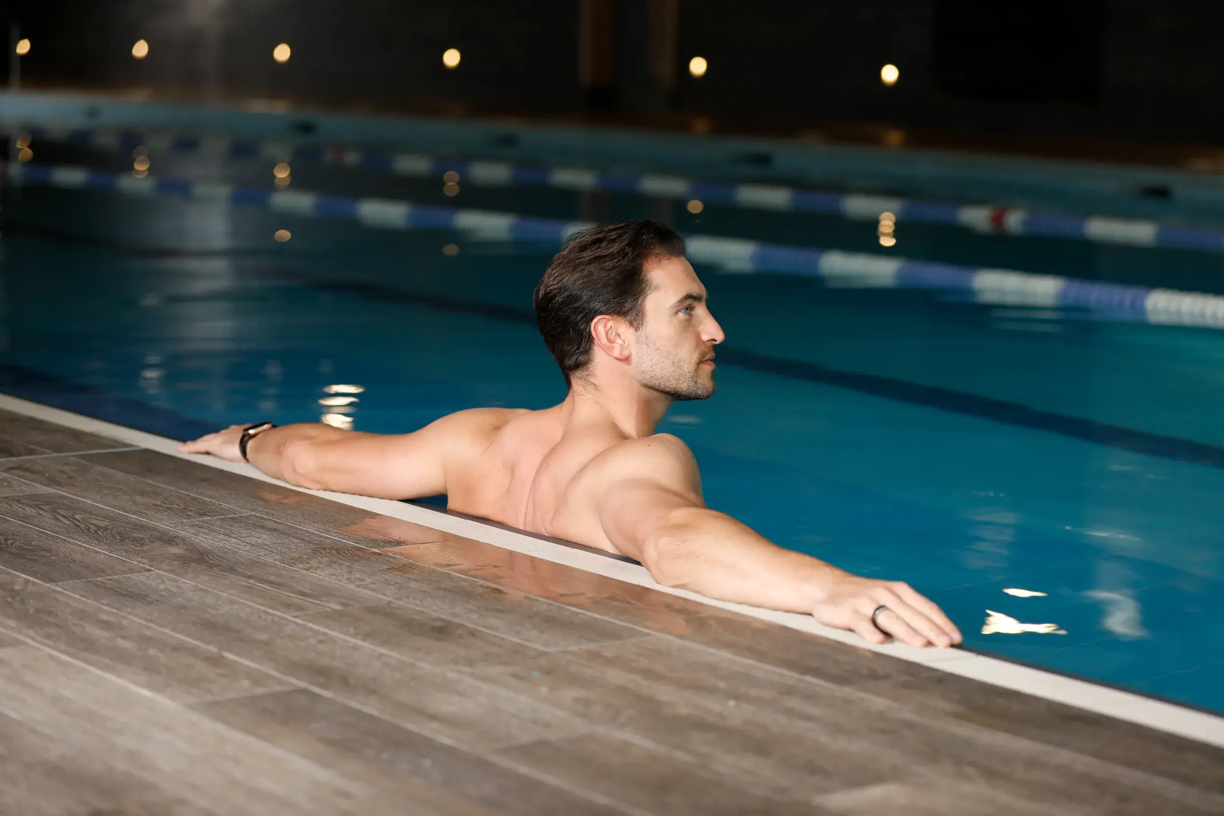 A man in the swimming pool at David Lloyd Raynes Park
