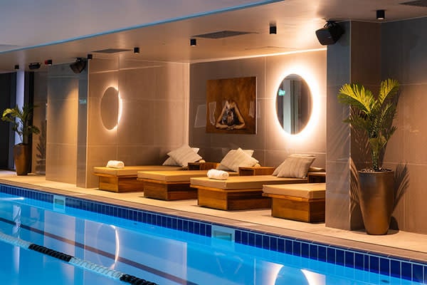 People enjoying the indoor pool