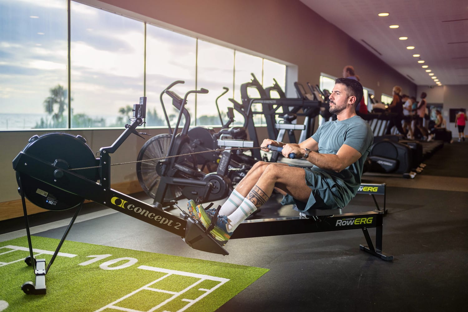 Three people running on treadmills